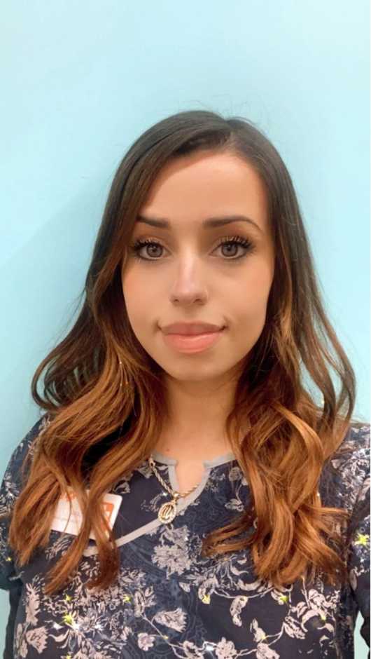 A female Banfield Associate
